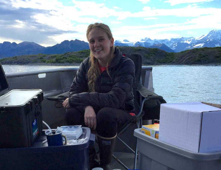 Carmen Harjoe sitting on boat in lake