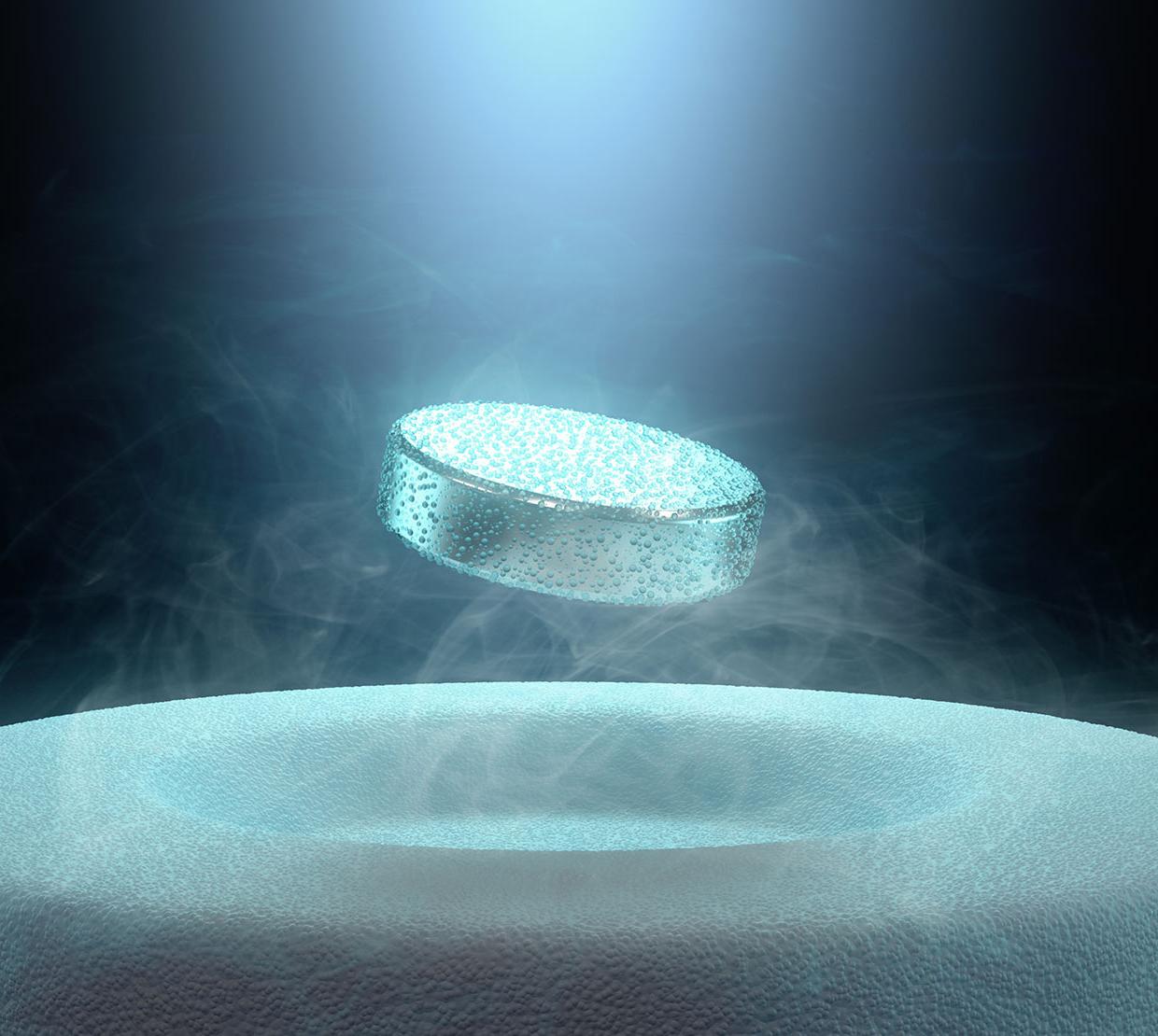 superconductor levitating small cylinder
