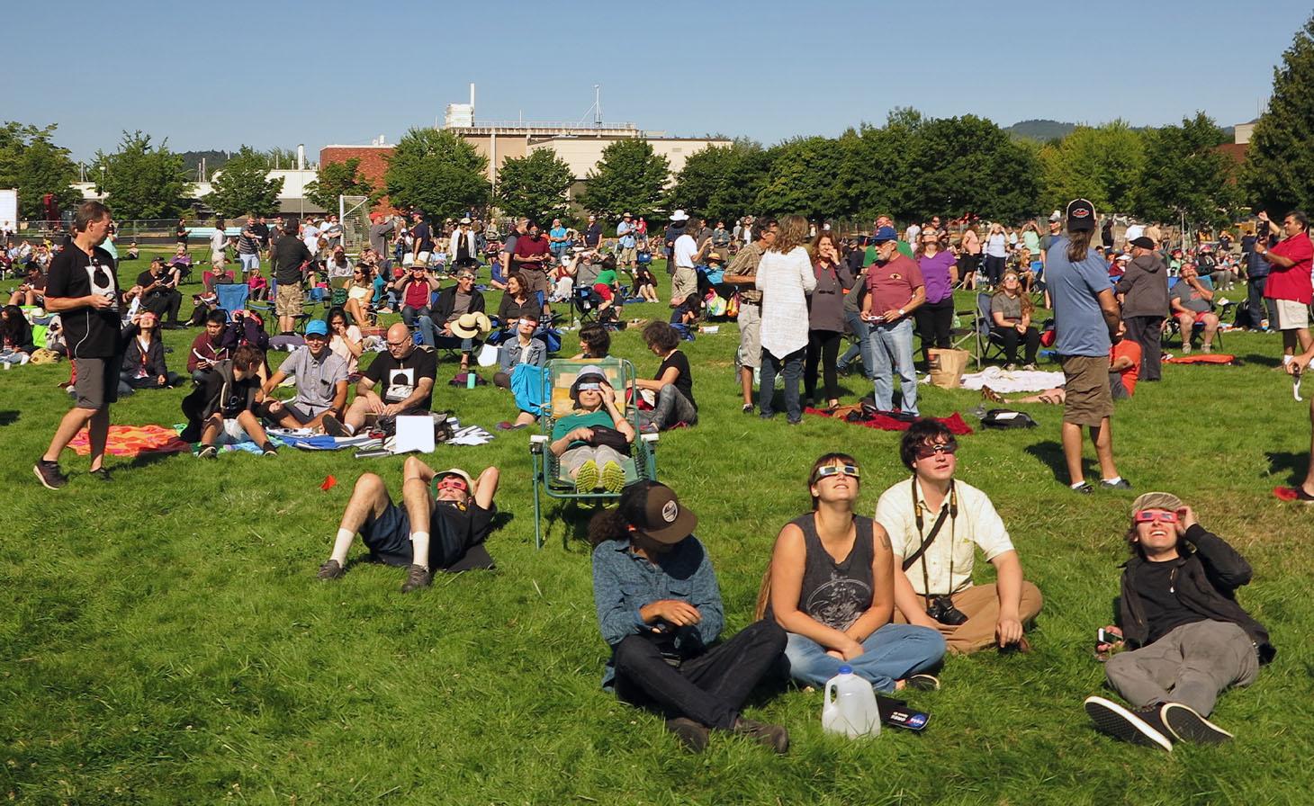 People gathered in a field for the 2017 eclipse.
